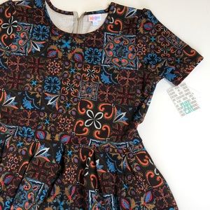 LuLaRoe Amelia Dress. She has pockets!!!